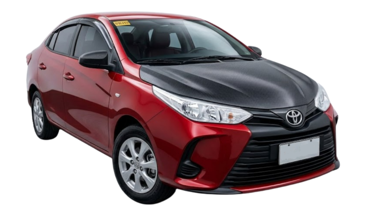 Three-quarter front view of a red Toyota Vios sedan featuring a custom black carbon fiber hood and blacked-out grille, isolated on a dark background.